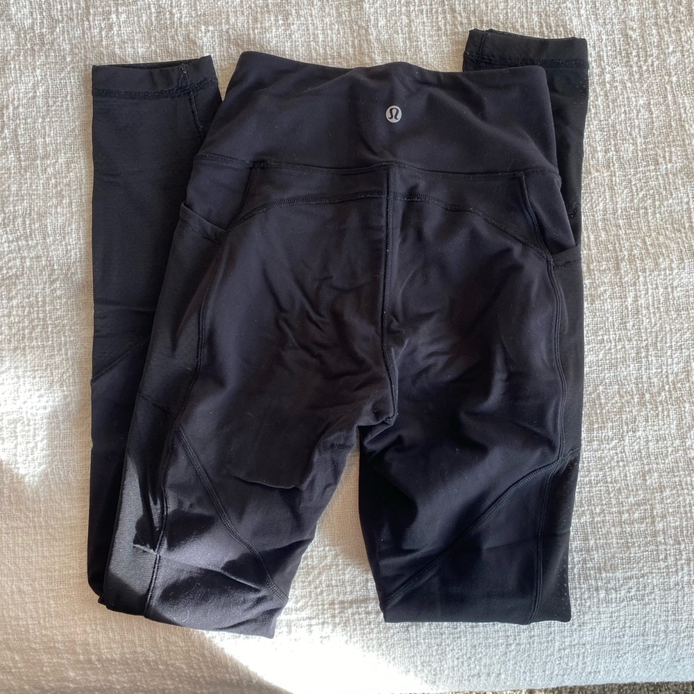 Black lulu leggings with mesh design and pockets
